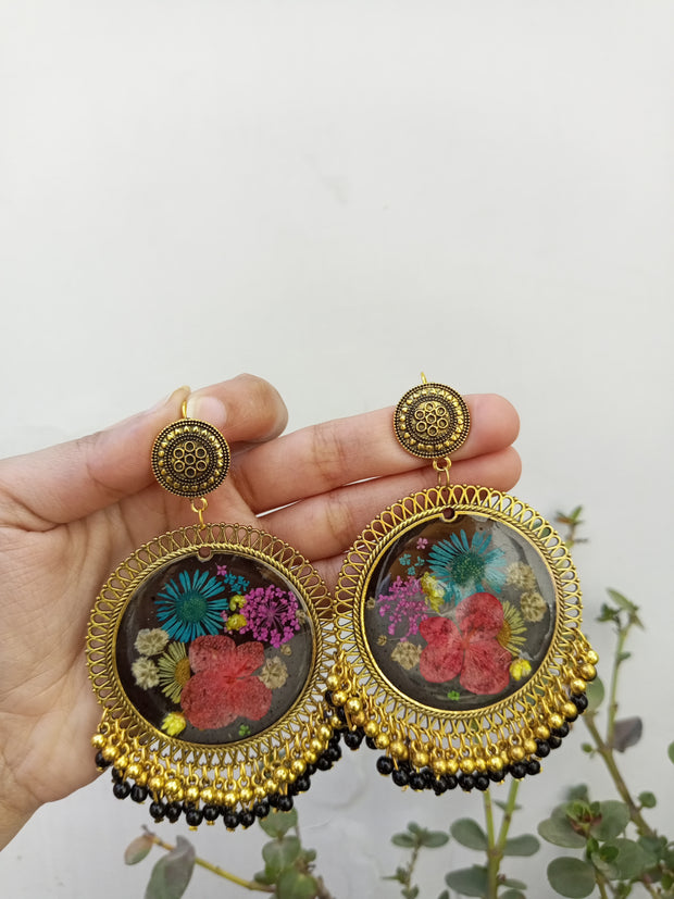 RESIN PRESERVED MULTI   FLOWER BLACK BASE  JHUMKA  EARRINGS