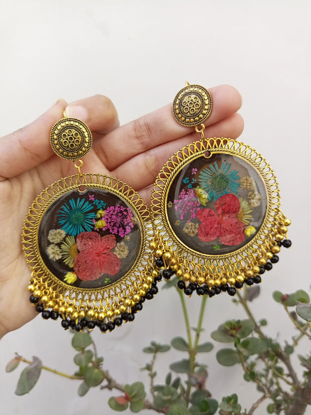 RESIN PRESERVED MULTI   FLOWER BLACK BASE  JHUMKA  EARRINGS