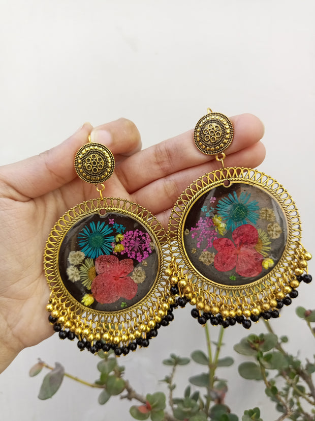 RESIN PRESERVED MULTI   FLOWER BLACK BASE  JHUMKA  EARRINGS