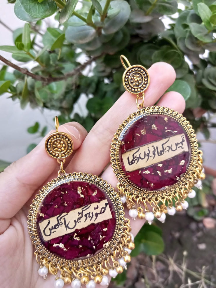 PRSERVE ROSE CRUSH FLOWER IN JHUMKA AND WRITE HAND WRITTEN POETRY