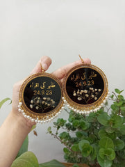 preserve white baby breath flower in oversize jhumka with date and " tahir ki iqra"