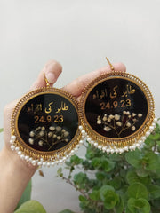 preserve white baby breath flower in oversize jhumka with date and " tahir ki iqra"
