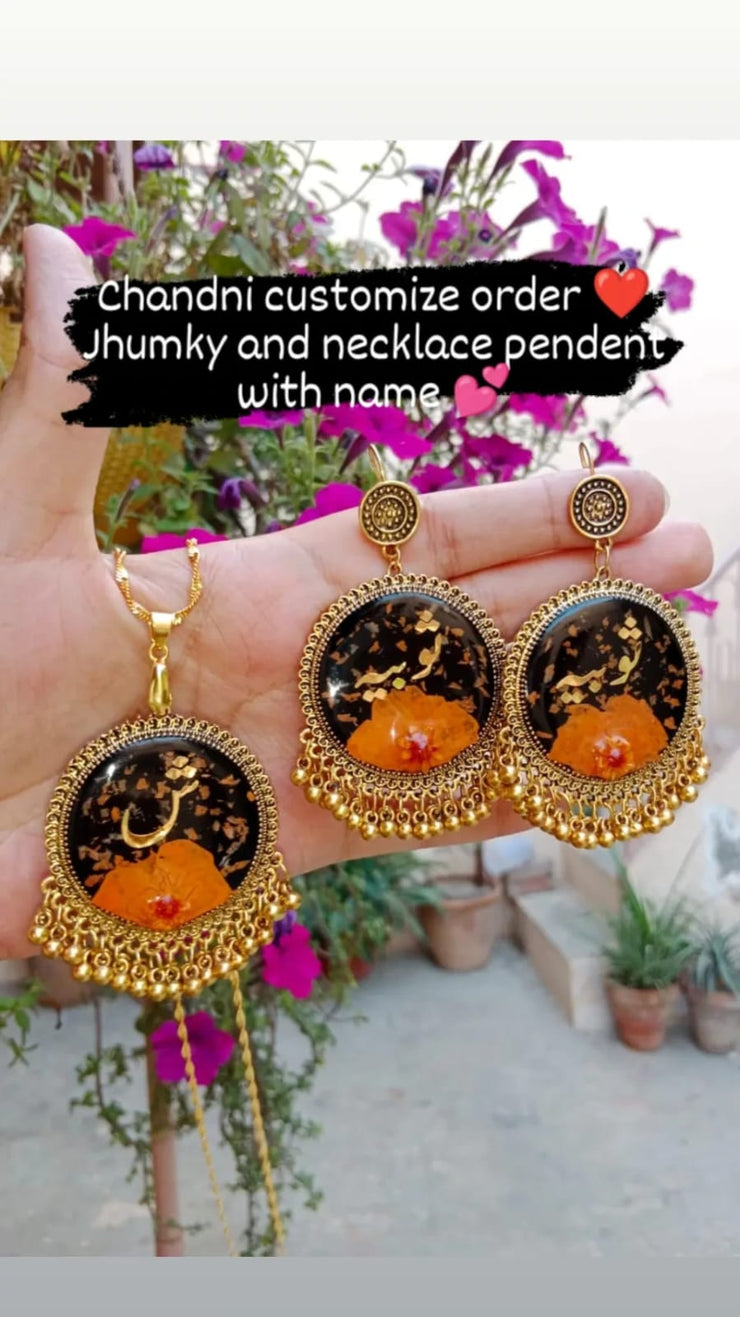 preserve flower in jhumka and pendant with name " sobia "