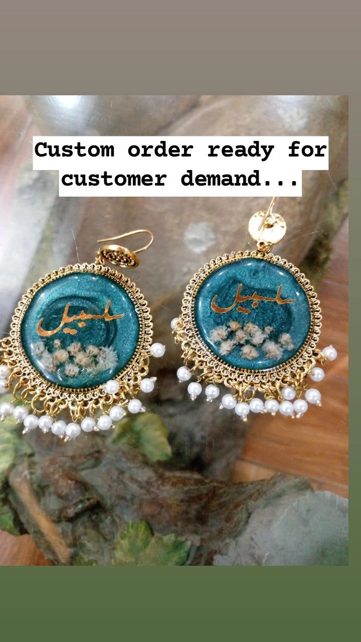 preserve white baby breath in jhumka with name "Salsabeel"