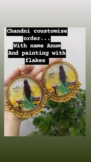 preserve painting in oversize jhumka with name "anum"