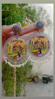 preserve handmade painting in jhumka with poetry
