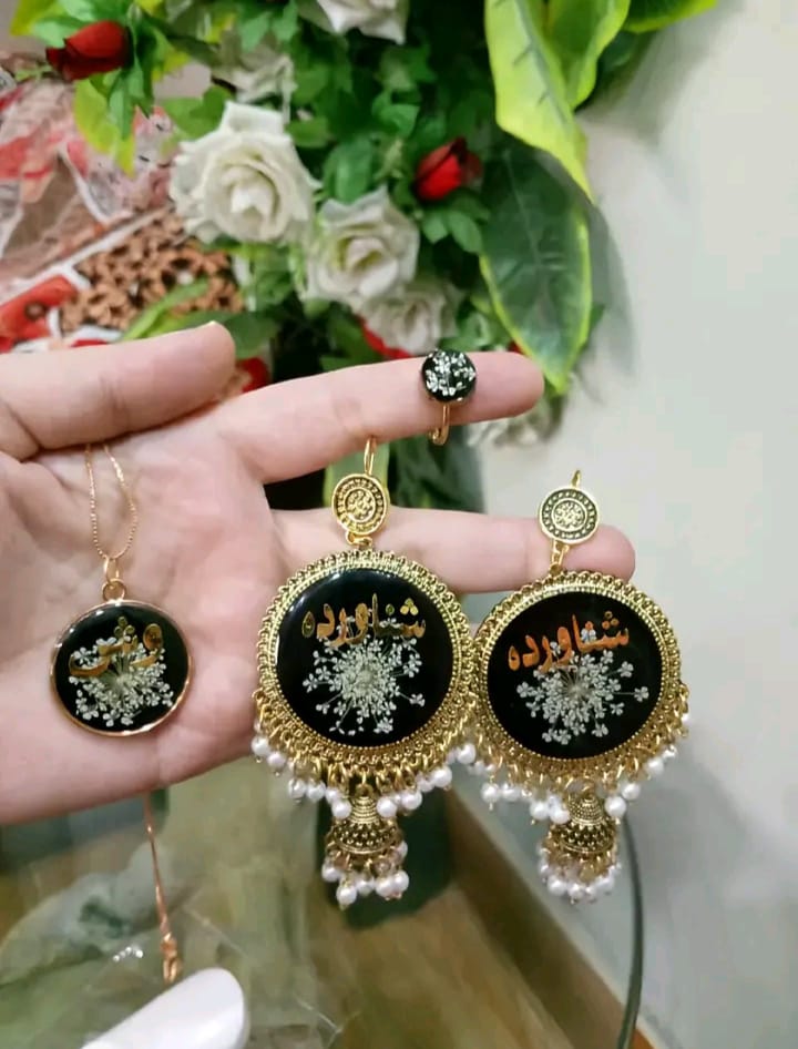 preserve flower in jhumka ,ring and pendant set with name "shanawarda"or  "وش "