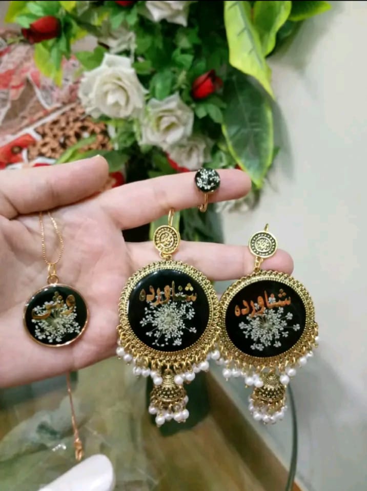 preserve flower in jhumka ,ring and pendant set with name "shanawarda"or  "وش "