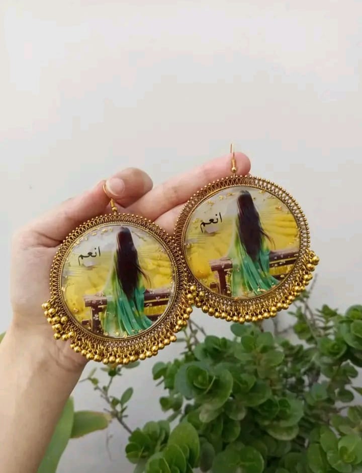 preserve painting in oversize jhumka with name "anum"